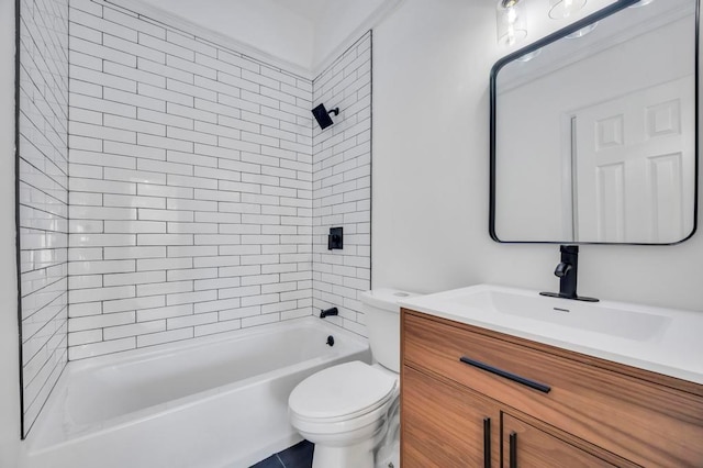 full bathroom featuring vanity, toilet, and tiled shower / bath