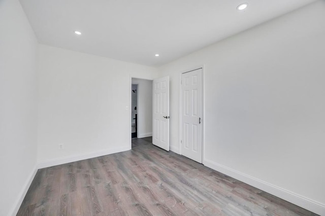 spare room with light hardwood / wood-style floors