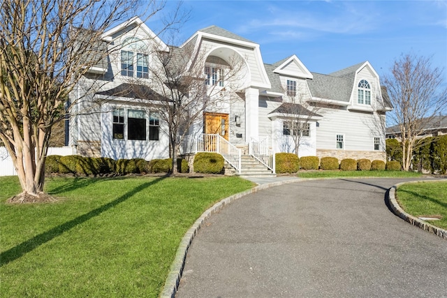 view of front of property with a front lawn