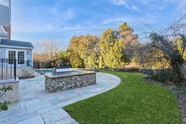 view of yard with a patio area