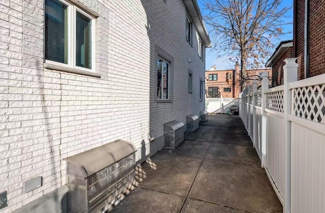 view of property exterior featuring a patio