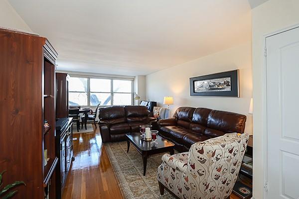 living room featuring dark wood-type flooring