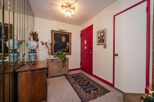 entrance foyer featuring a chandelier