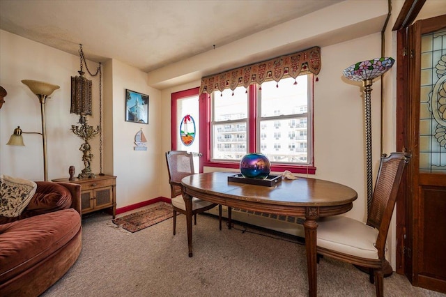 view of carpeted dining space