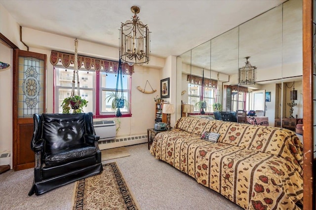 living room with carpet flooring, a baseboard radiator, and a notable chandelier