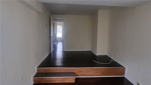 staircase with wood-type flooring