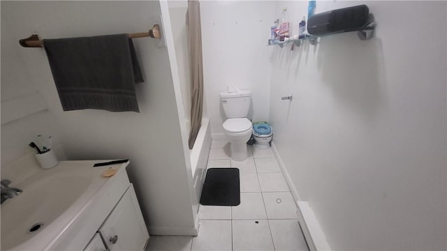 bathroom featuring a shower with curtain, tile patterned flooring, vanity, and toilet