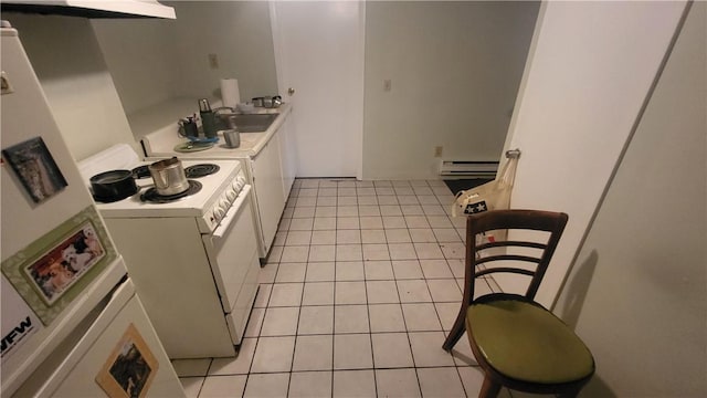 kitchen with sink, light tile patterned floors, a baseboard radiator, white range with electric stovetop, and white cabinetry