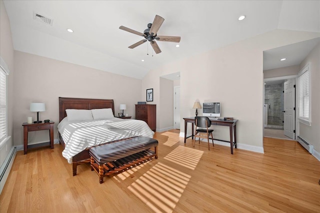 bedroom with a baseboard heating unit, light hardwood / wood-style flooring, ceiling fan, and lofted ceiling