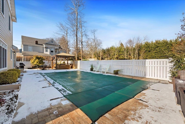 view of swimming pool with a gazebo