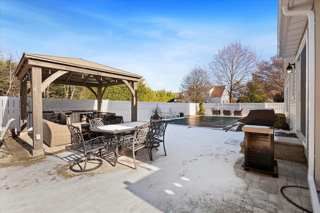 view of patio / terrace with a gazebo and grilling area