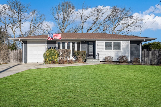 single story home featuring a garage and a front lawn