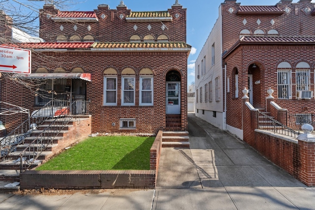 view of front of home with cooling unit