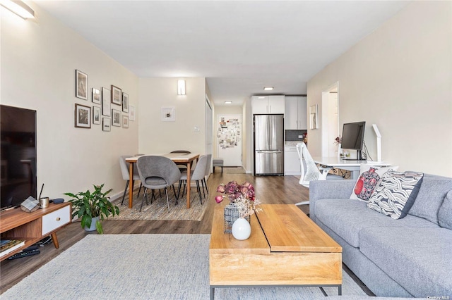 living room with dark hardwood / wood-style floors