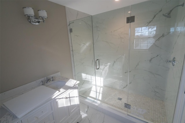 bathroom with vanity and an enclosed shower