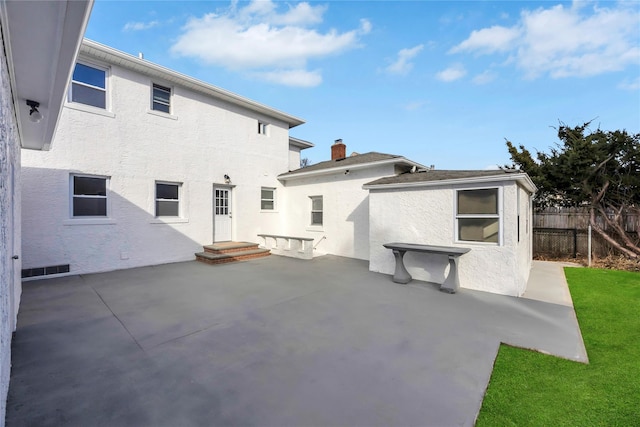 rear view of house featuring a patio area