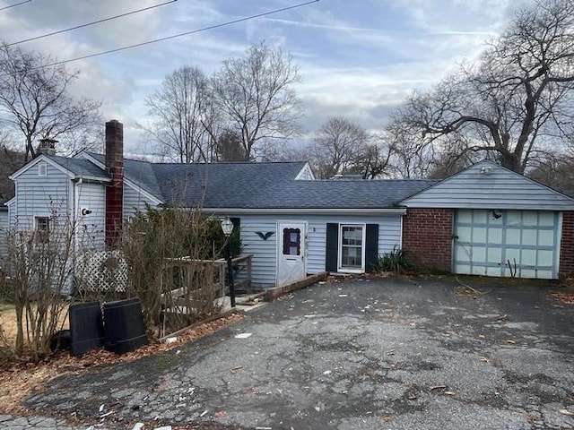 single story home featuring a garage