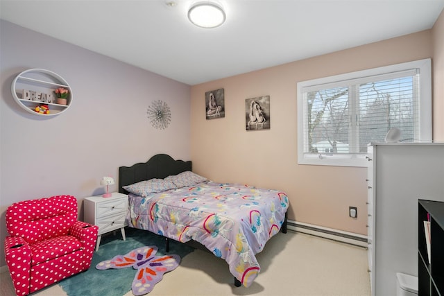 bedroom with carpet flooring and a baseboard radiator