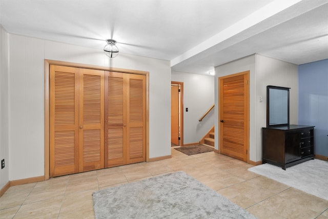 foyer with light tile patterned flooring