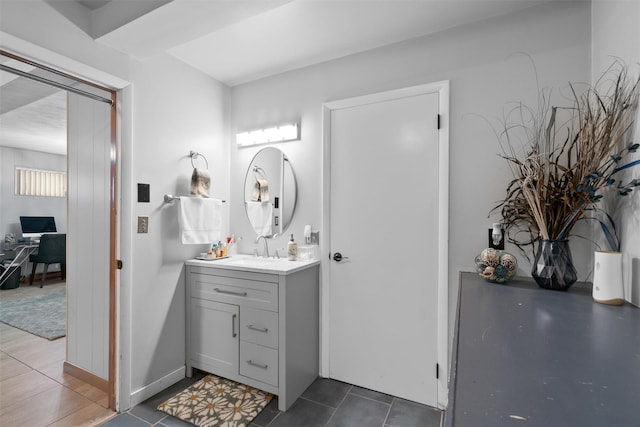 bathroom featuring vanity and tile patterned flooring