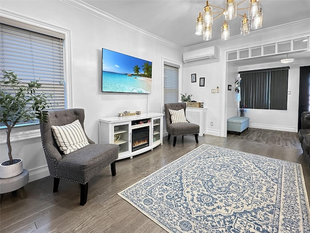 living area with crown molding, dark hardwood / wood-style floors, a wall mounted air conditioner, and an inviting chandelier