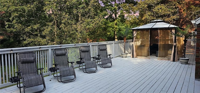 wooden terrace with a gazebo