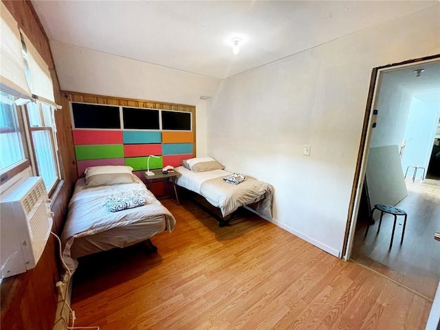 bedroom with light wood-type flooring