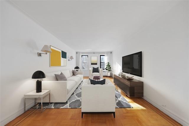 living room featuring parquet floors