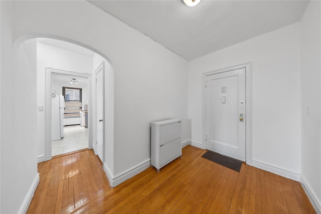 entrance foyer featuring light hardwood / wood-style floors