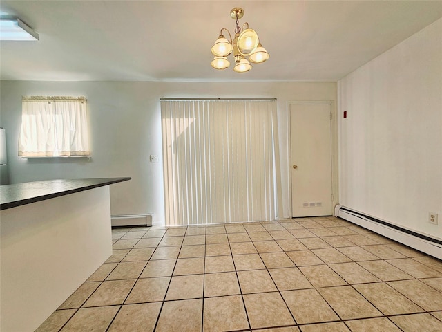 unfurnished dining area featuring a notable chandelier, light tile patterned flooring, and a baseboard heating unit