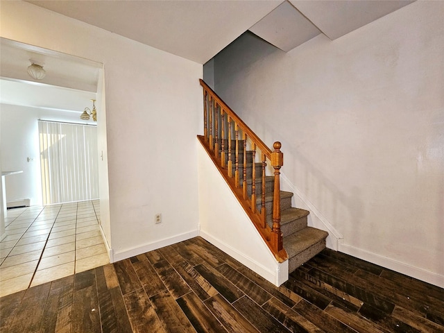 stairs with baseboard heating