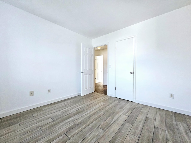 unfurnished bedroom with light hardwood / wood-style flooring