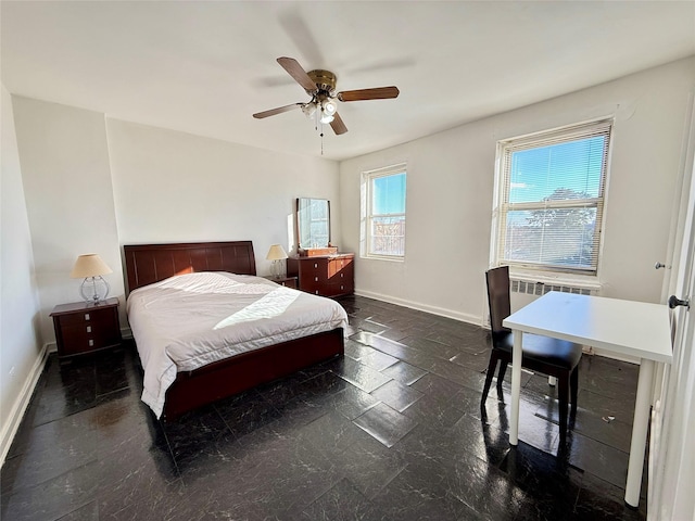 bedroom featuring radiator and ceiling fan