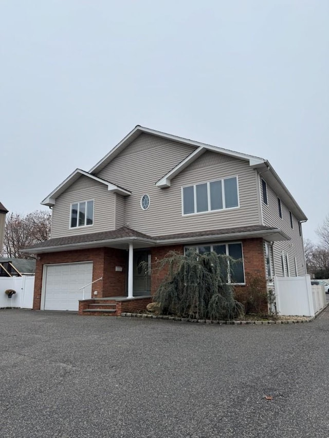 view of front of home with a garage