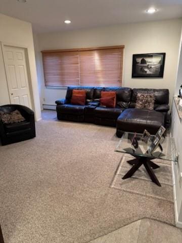 living room featuring a baseboard heating unit