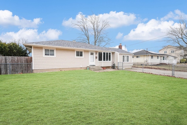 view of front of home with a front lawn