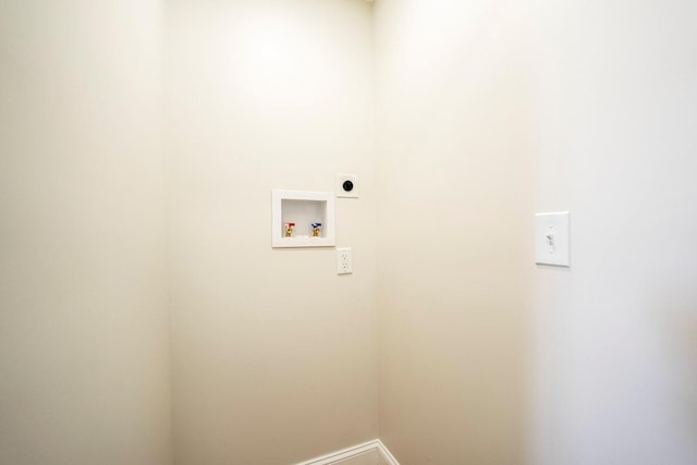 laundry room featuring hookup for a washing machine and electric dryer hookup