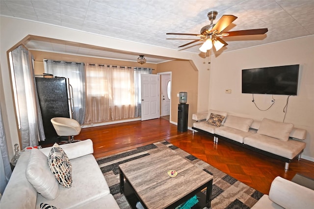 living room featuring ceiling fan