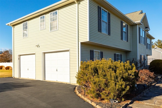 view of home's exterior with a garage