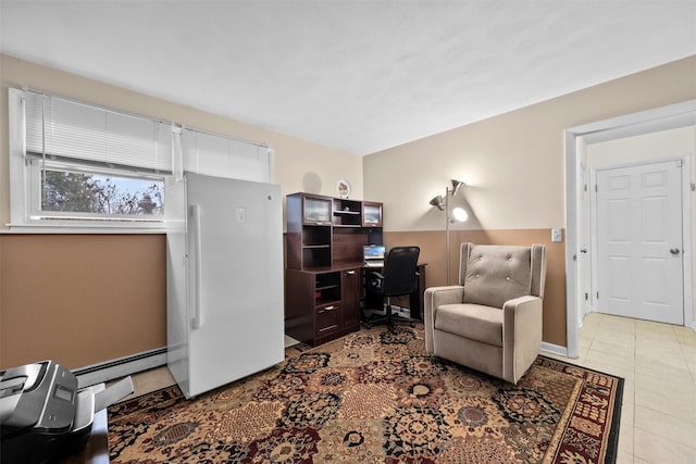 tiled office space with a baseboard radiator