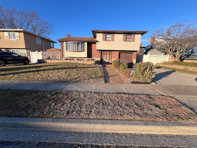 split level home featuring a garage