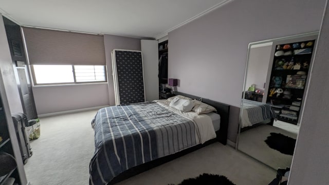 bedroom featuring light colored carpet and ornamental molding