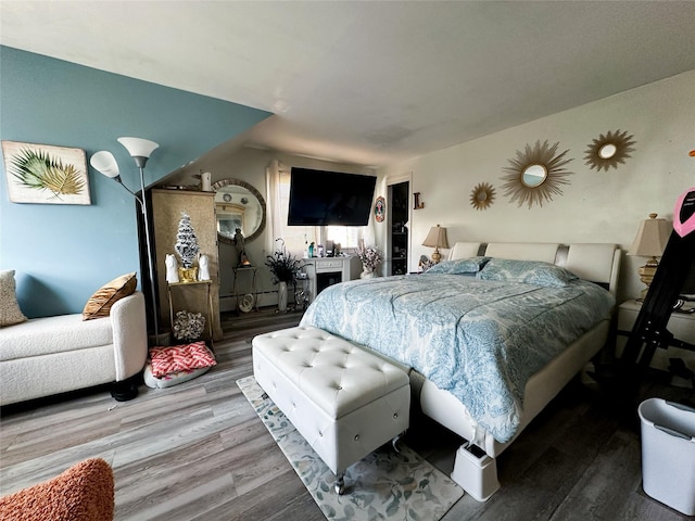 bedroom featuring hardwood / wood-style floors