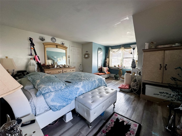 bedroom featuring hardwood / wood-style flooring