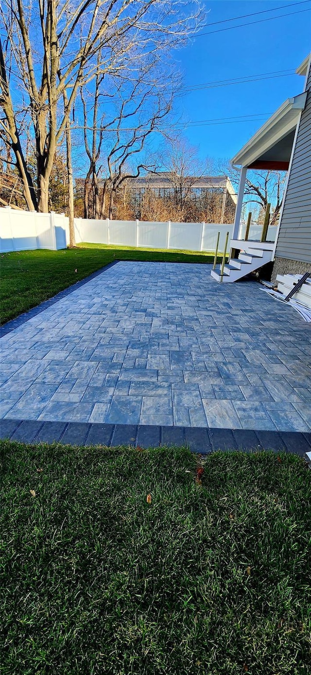 57 William St, Bethpage, NY 11714 - fenced backyard featuring a patio
