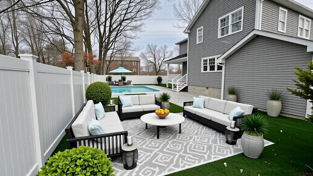 57 William St, Bethpage, NY 11714 - fenced backyard with an outdoor living space and a patio area