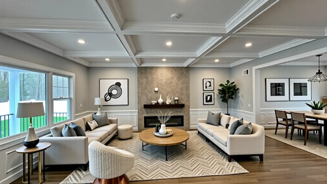57 William St, Bethpage, NY 11714 - living room with recessed lighting, beam ceiling, dark wood-style floors, coffered ceiling, and a large fireplace
