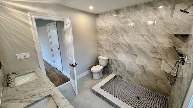 57 William St, Bethpage, NY 11714 - bathroom with a tile shower, double vanity, and recessed lighting