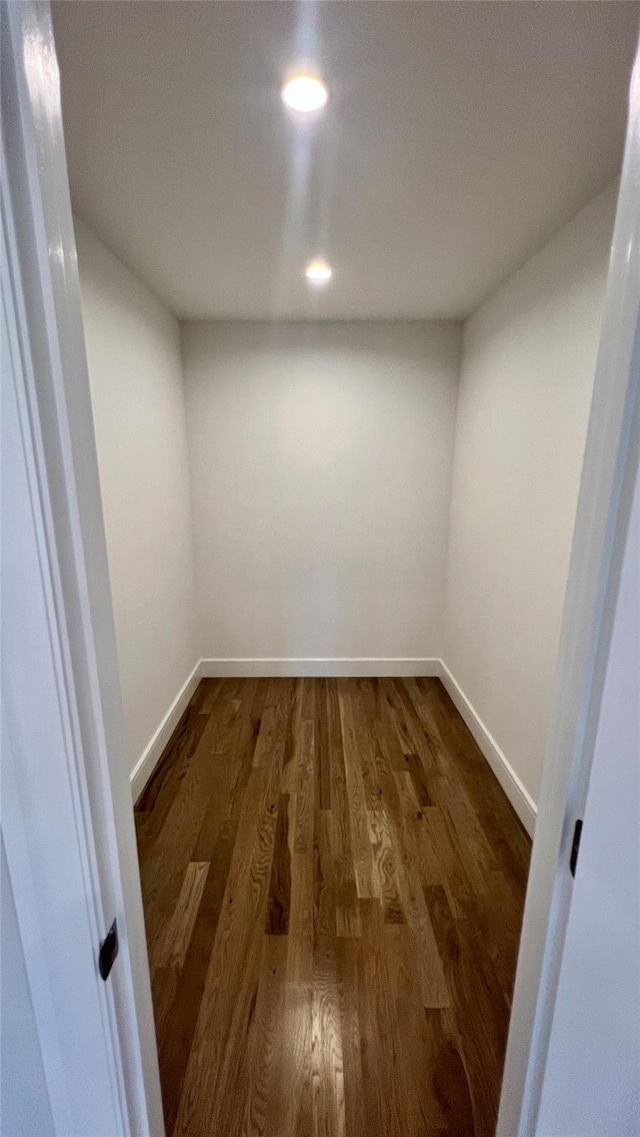 57 William St, Bethpage, NY 11714 - spare room with dark wood-type flooring and recessed lighting