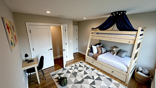 57 William St, Bethpage, NY 11714 - bedroom with wood finished floors and recessed lighting